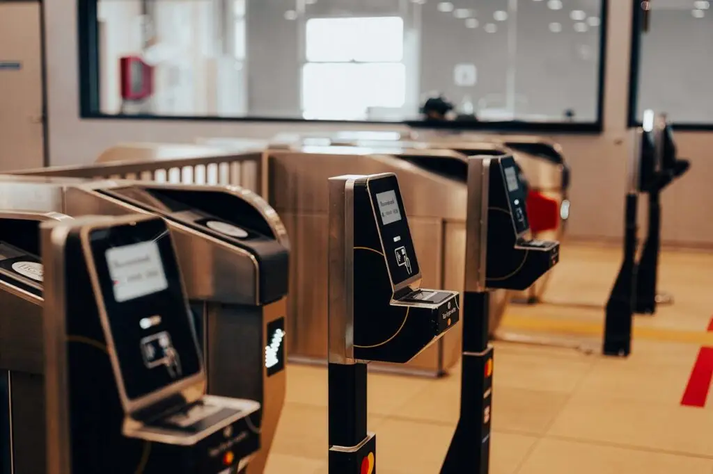 pexels photo 36089402 Electronic ticket turnstiles in a Ho Chi Minh City transit station, showcasing modern technology.